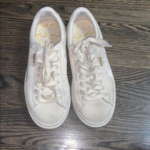 Nude puma suede worn shoes